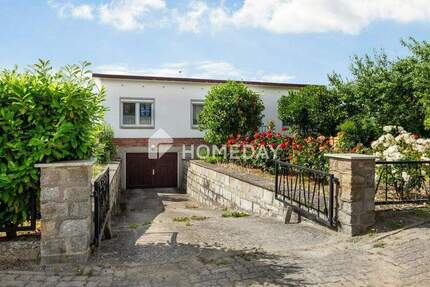 Bungalow mit Kamin, Wintergarten und großem Grundstück 4 zimmer