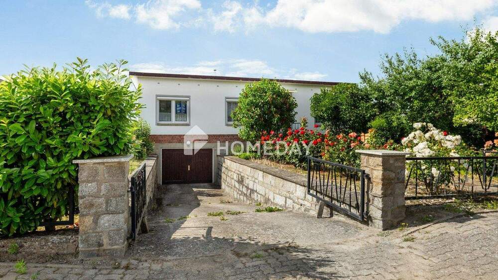 Bungalow mit Kamin, Wintergarten und großem Grundstück 4 zimmer