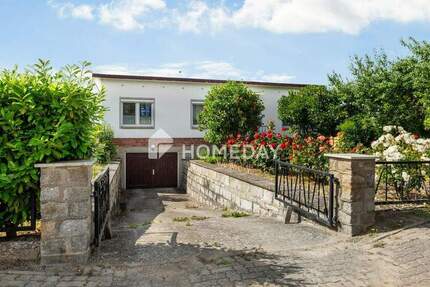 Bungalow mit Kamin, Wintergarten und großem Grundstück 4 zimmer